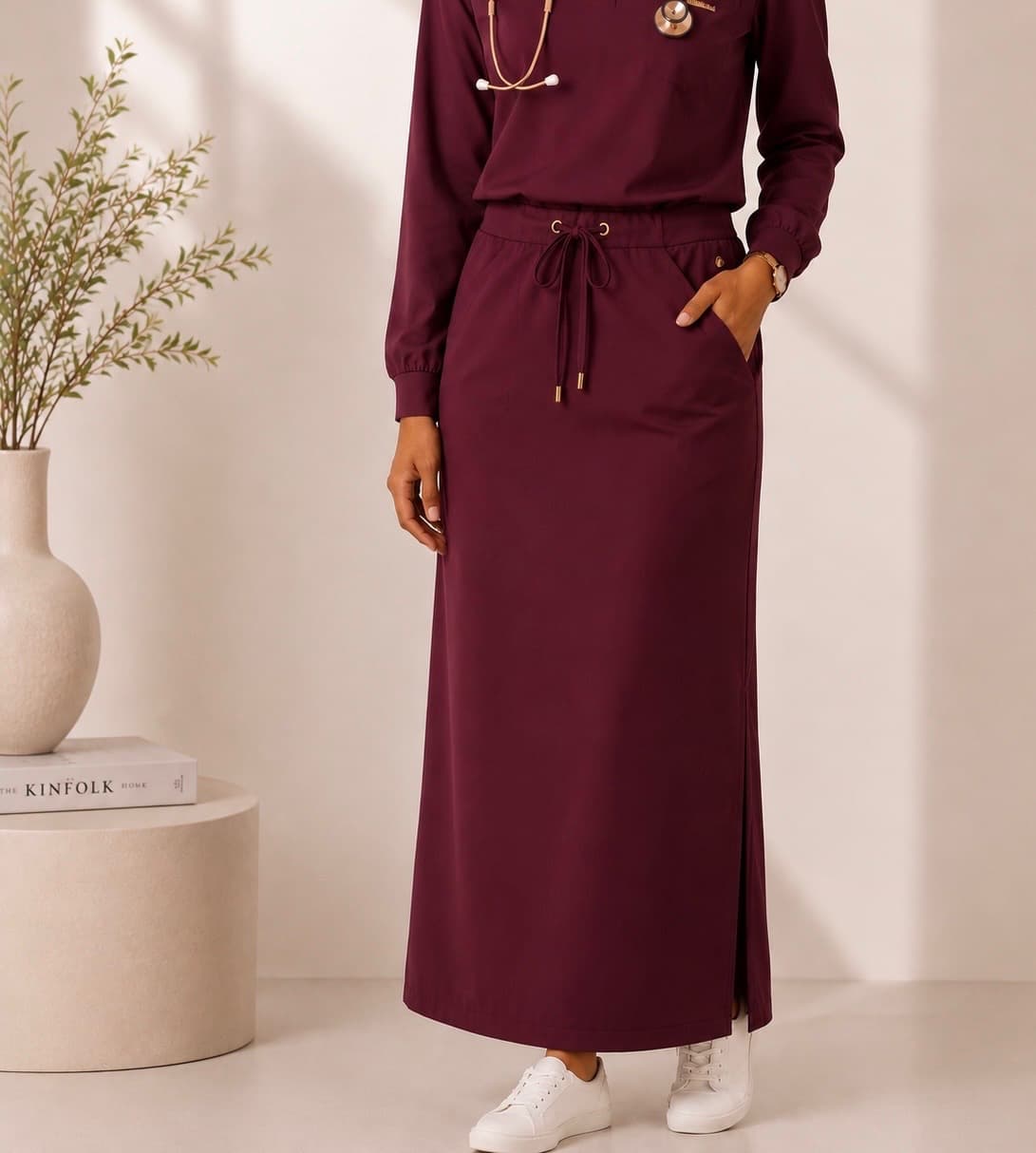 Burgundy drawcord scrub skirt with a long-sleeve top